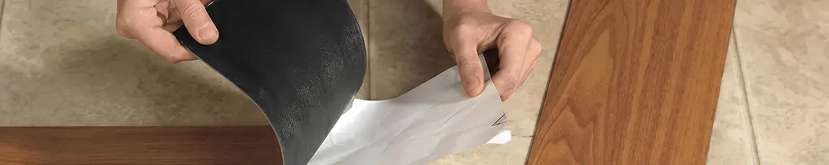 A professional installing vinyl flooring in West Palm Beach, FL